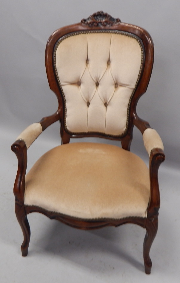 Appraisal: A Continental stained beech open armchair in the French style