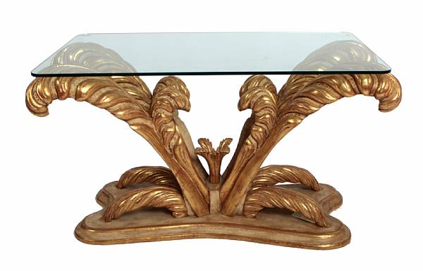 Appraisal: An Art Moderne style giltwood table with glass top on