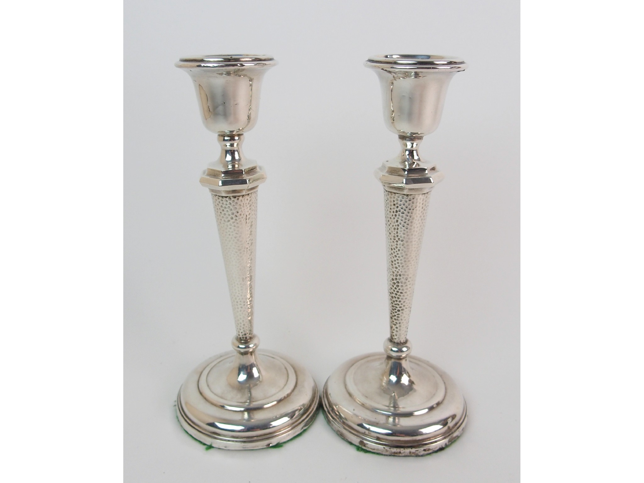 Appraisal: A pair of silver candlesticksmaker's marks indistinct probably Henry Williamson