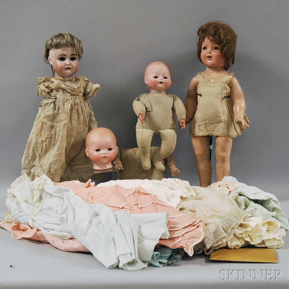 Appraisal: Bisque Head Girl Doll with Two A M Baby Dolls