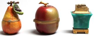 Appraisal: Tabletop Cigarette Lighters a Trinket Box Comprising an Evans apple-shaped