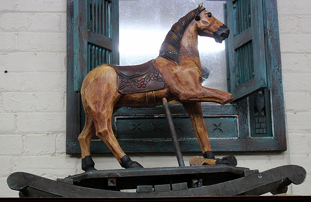 Appraisal: A CONTINENTAL CARVED WOODEN HORSE from Bow Rocker cm long