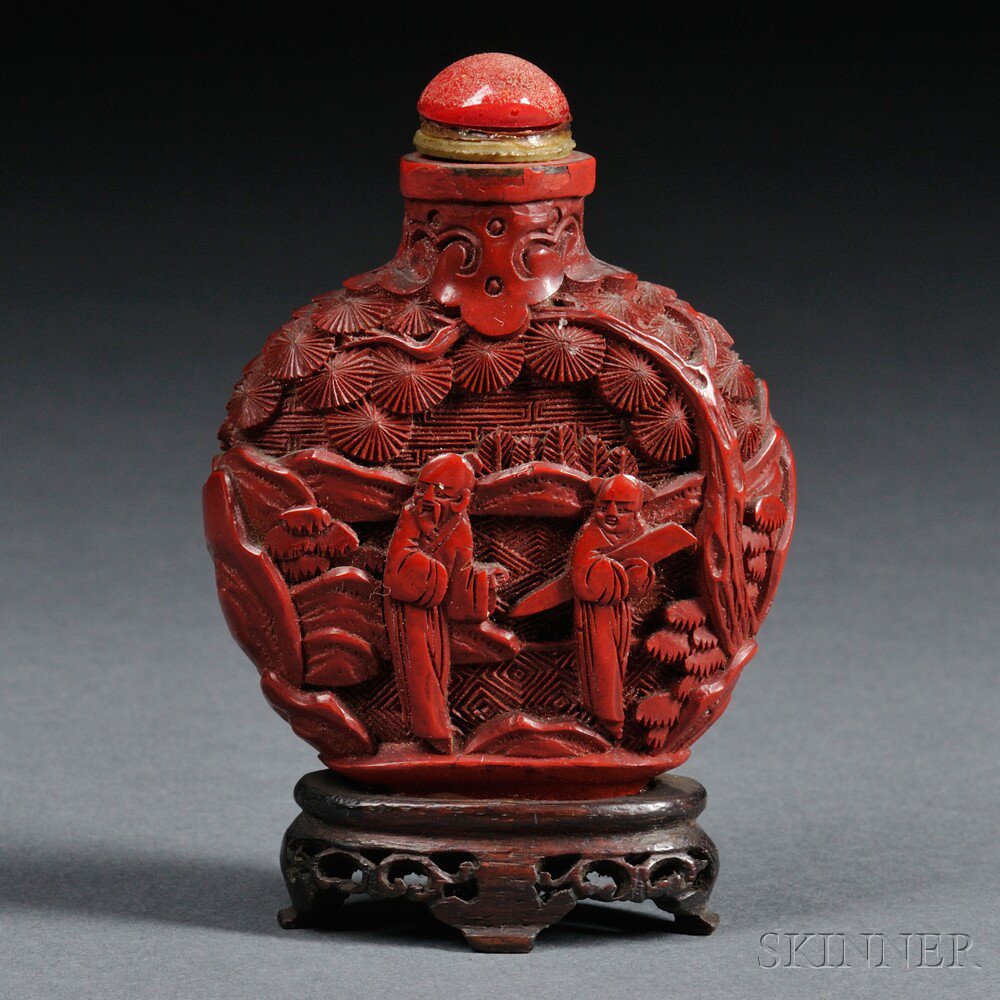 Appraisal: Cinnabar-style Snuff Bottle China th th century pebble shape decorated