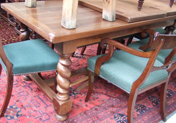 Appraisal: A th century hardwood dining table raised on barley twist