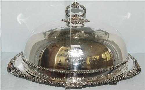 Appraisal: CLOCHE WITH TRAY Silver-gilt Oval shape smooth with opulent gadrooned