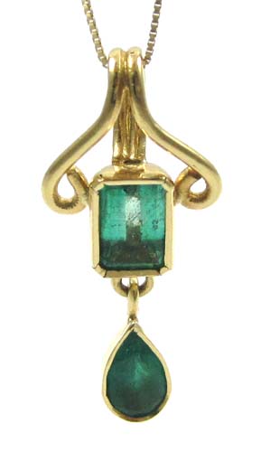 Appraisal: EMERALD AND FOURTEEN KARAT GOLD PENDANT NECKLACE suspended on an