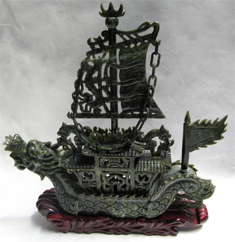 Appraisal: A HARDSTONE JADE HAND CARVED CHINESE JUNK SHIP with pierced