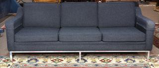 Appraisal: Mid-Century Modern sofa executed in blue having contoured arms and