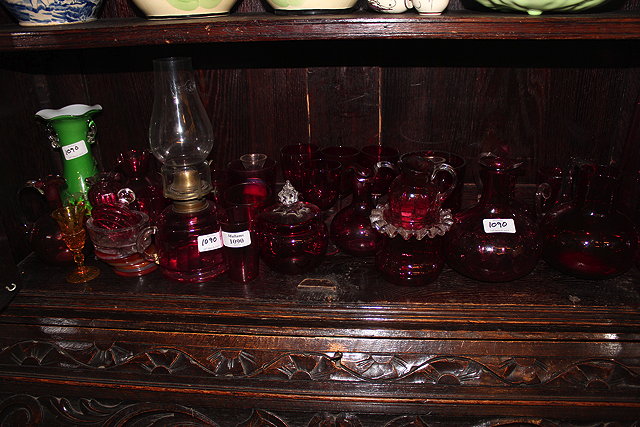 Appraisal: A COLLECTION OF VARIOUS CRANBERRY GLASSES to include beakers vases