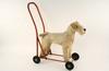 Appraisal: PLUSH RIDING TOY - English-made Wire Haired Terrier on wheeled