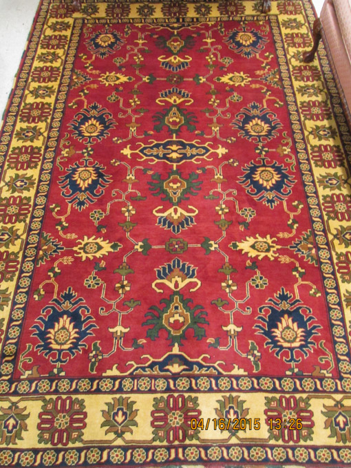 Appraisal: HAND KNOTTED ORIENTAL CARPET Pakistani Persian tribal stylized floral decoration