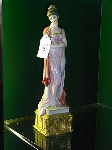 Appraisal: A NAPLES FIGURE of Josephine wearing a pink flowing dress