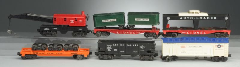 Appraisal: Lot includes Lionel - orange flat car with trucks which