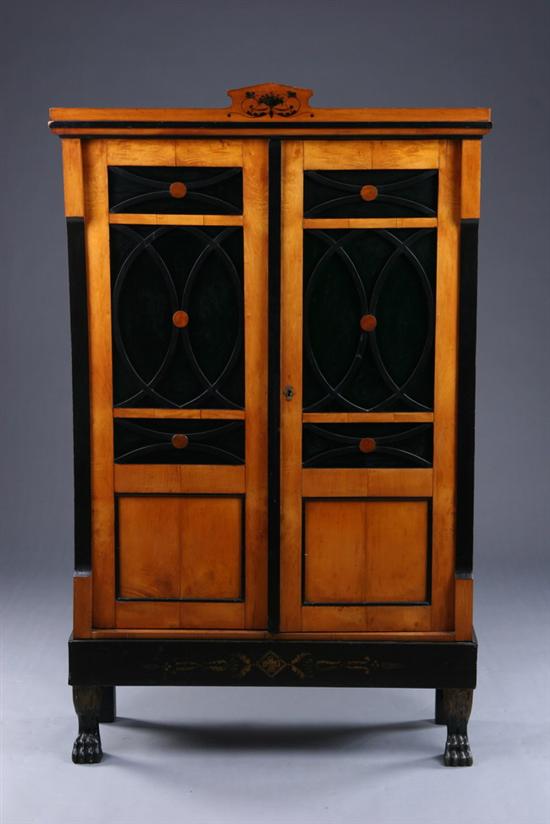 Appraisal: BIEDERMEIER FRUITWOOD TWO-DOOR CABINET early-to-mid th century Handpainted crest two