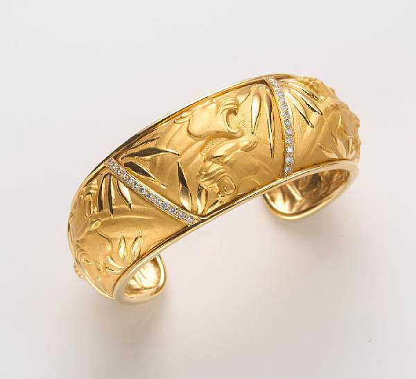 Appraisal: A diamond and k gold panther motif cuff bangle bracelet