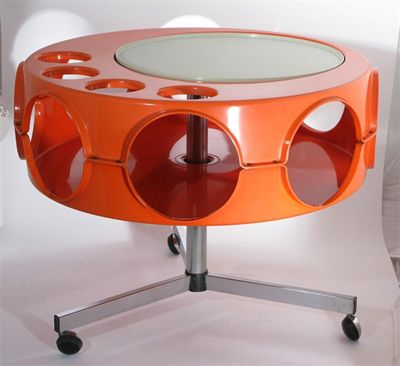 Appraisal: A s UFO orange plastic drinks table with circular tray