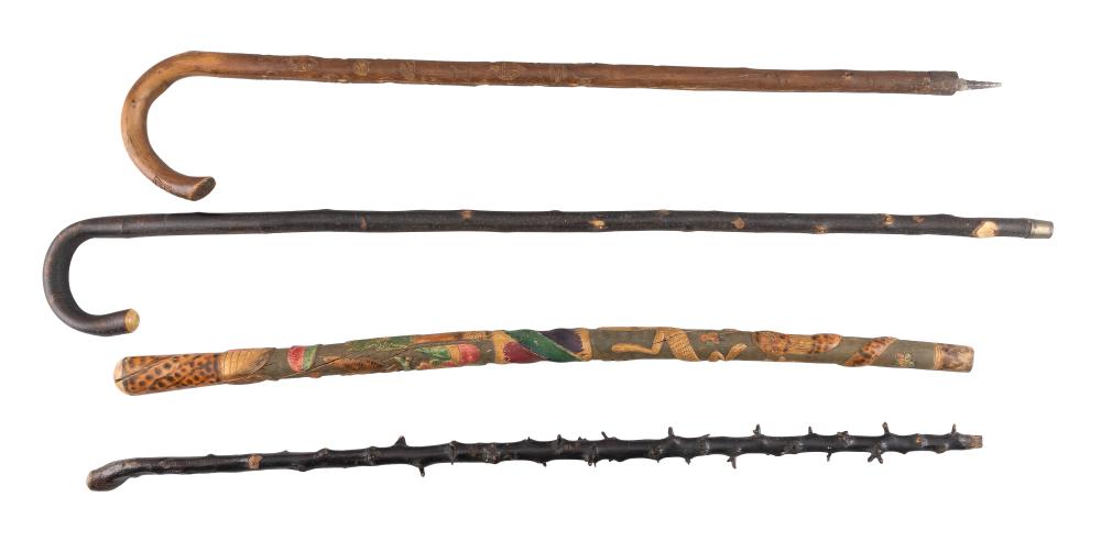 Appraisal: FOUR WOOD CANES AND WALKING STICKS EARLY TH CENTURYFOUR WOOD