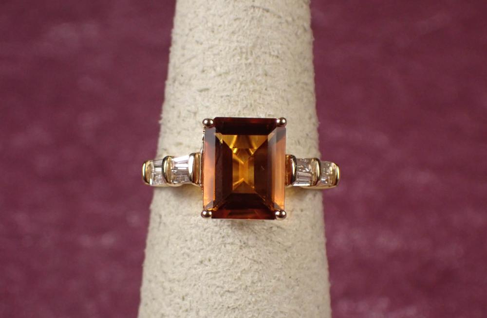 Appraisal: CITRINE DIAMOND AND FOURTEEN KARAT GOLD RING The yellow gold