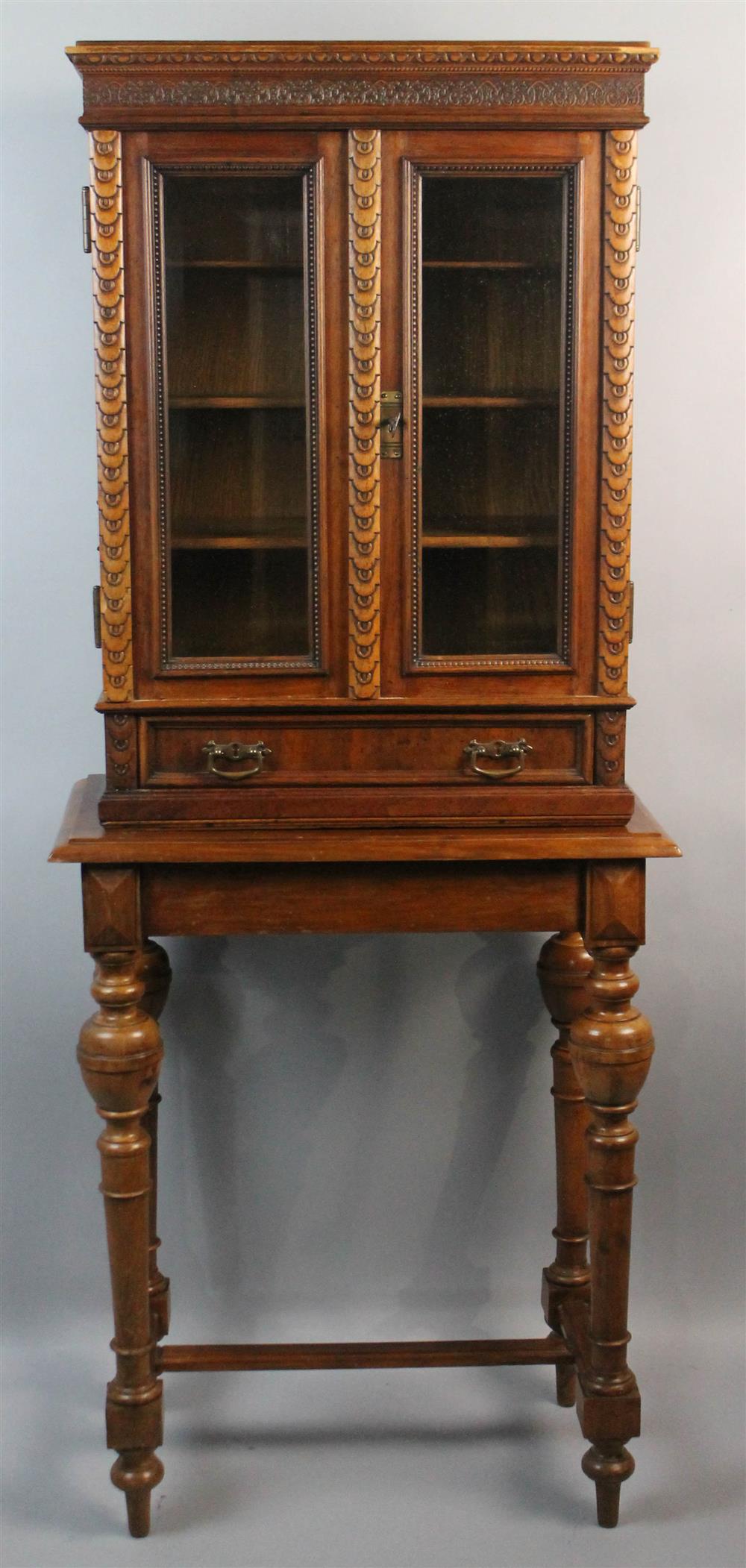 Appraisal: BAROQUE STYLE CARVED CABINET ON STAND having an upper section