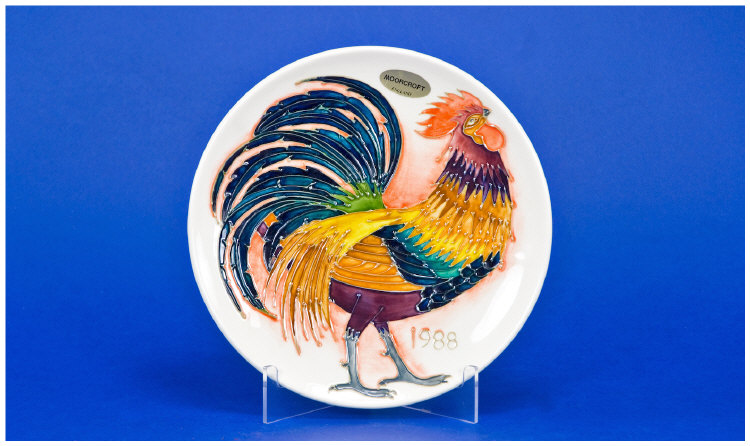 Appraisal: A Moorcroft Year Plate Featuring a Crowing Cockerel in the