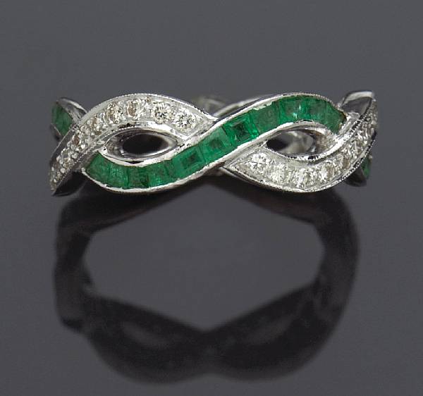 Appraisal: An emerald and diamond eternity ring estimated total emerald weight