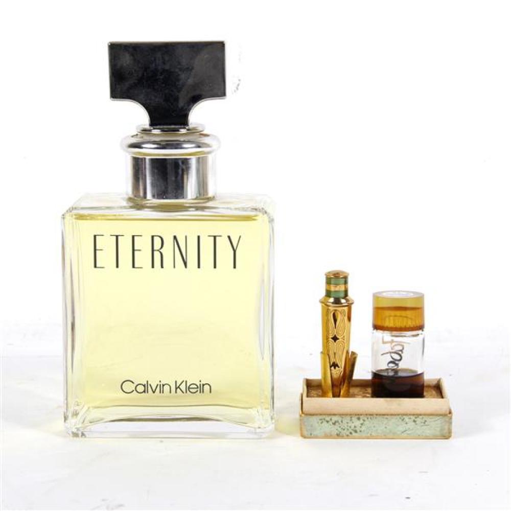 Appraisal: TWO VINTAGE PERFUME BOTTLES GIANT ETERNITY CALVIN KLEIN STORE COUNTER