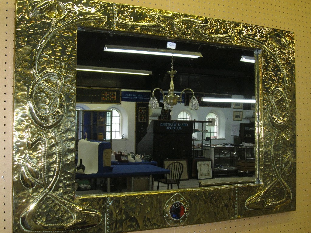 Appraisal: Embossed brass framed mirror with enamel roundel