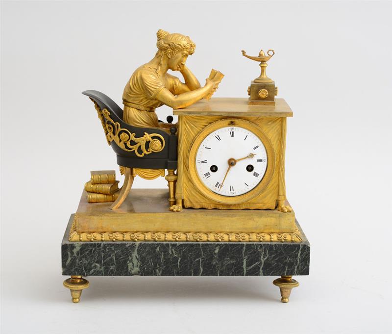 Appraisal: EMPIRE PATINATED AND GILT-BRONZE FIGURAL CLOCK The in enamel dial