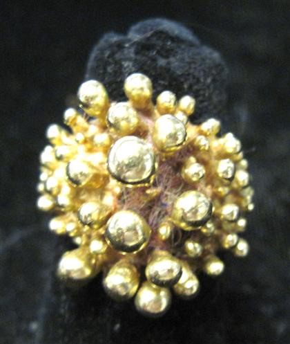 Appraisal: karat yellow gold cluster ringFreeform yellow gold bombe form ring