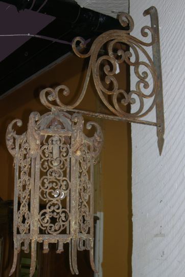 Appraisal: Large Pair of Moorish-Style Wrought-Iron Wall-Mounted Lanterns each supported by