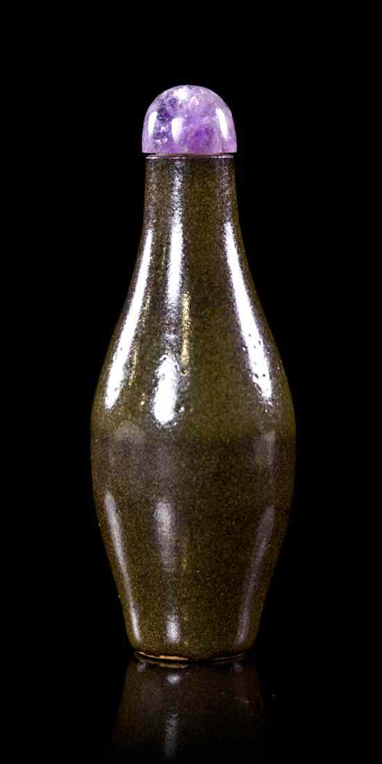 Appraisal: A Chinese Tea Dust Glaze Snuff Bottle of baluster form