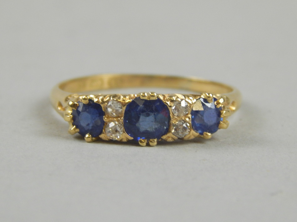 Appraisal: An ct gold sapphire and diamond ring with three sapphire