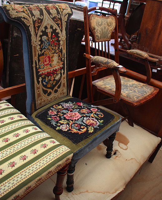 Appraisal: A VICTORIAN NEEDLEWORK UPHOLSTERED PRIE DIEU standing on turned ebonised