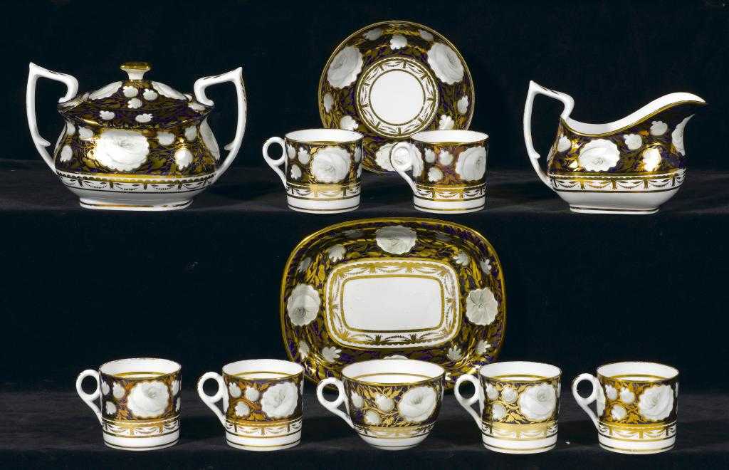 Appraisal: A MINTON COBALT GROUND TEA AND COFFEE SERVICE painted in