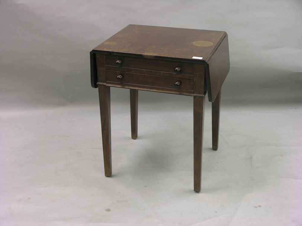 Appraisal: A mahogany occasional table with drop leaves single frieze drawer