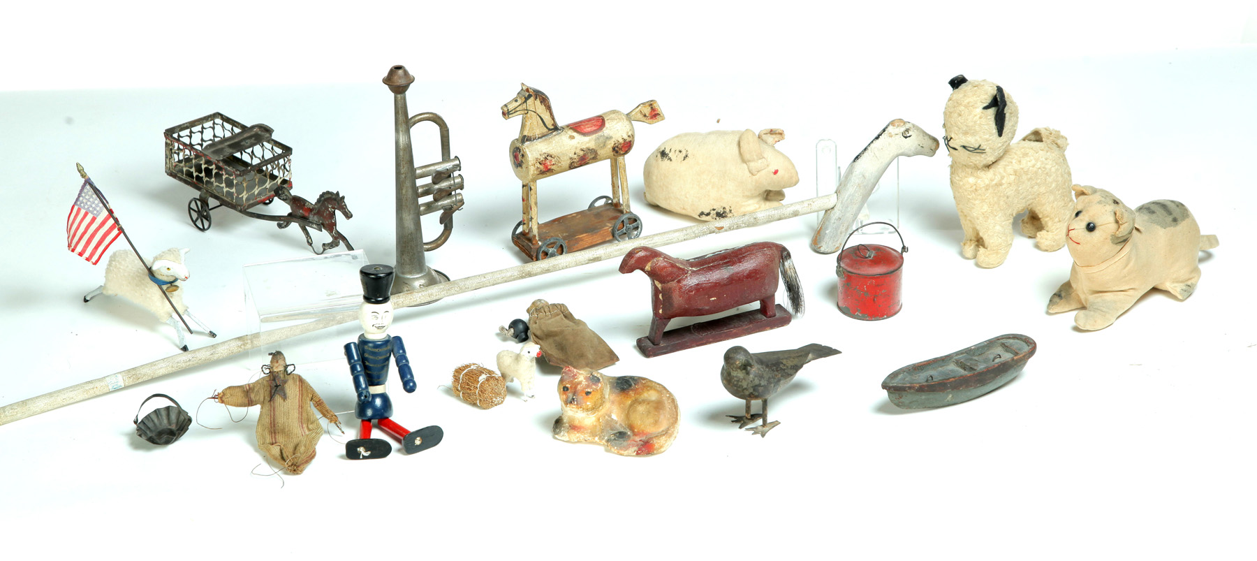 Appraisal: GROUP OF CHILDREN'S TOYS Nineteenth- th century Includes German wool