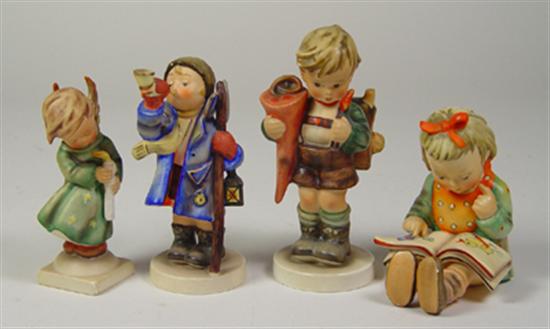 Appraisal: Four Hummel Figurines Boy with satchel girl with book angel