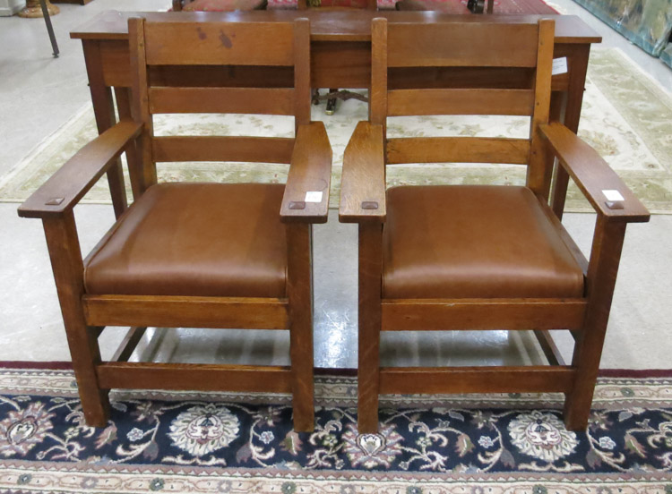 Appraisal: A PAIR OF AMERICAN ARTS CRAFTS OAK LADDER-BACK ARMCHAIRS Grand