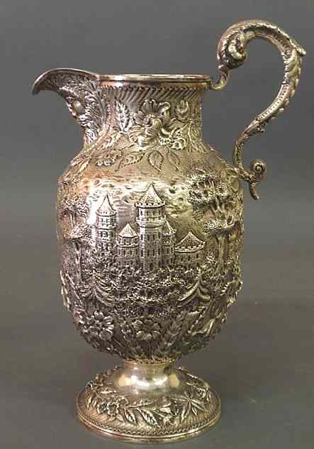 Appraisal: Sterling silver ewer with a repouss decorated castle and pagoda