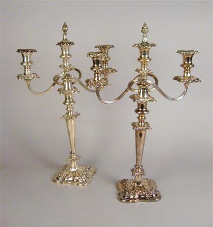 Appraisal: Pair of Sheffield silver plated three light candelabra Each with