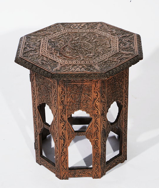 Appraisal: A CARVED BURMESE FOLDING TABLE the top with bird and