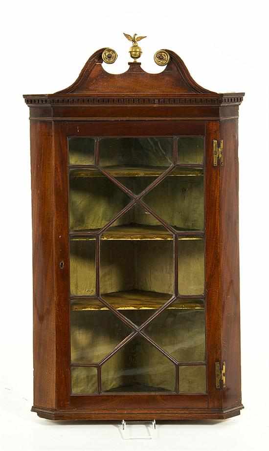 Appraisal: George III mahogany hanging corner cabinet early th century brass