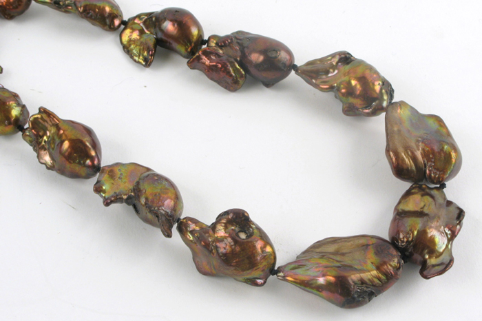 Appraisal: FRESHWATER BAROQUE PEARL NECKLACE strung with brown iridescent baroque pearls