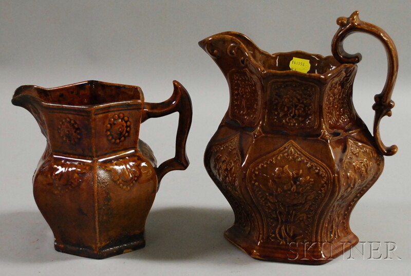 Appraisal: Two Bennington Pottery Rockingham Glazed Pitchers one Norton Fenton Bennington