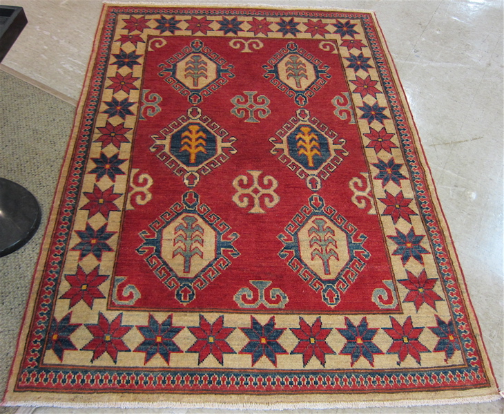 Appraisal: HAND KNOTTED ORIENTAL AREA RUG Caucasian Kazak design featuring six