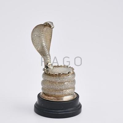 Appraisal: SILVER COBRA FORM INKWELL INSCRIBED Coiled hooded cobra with ruby