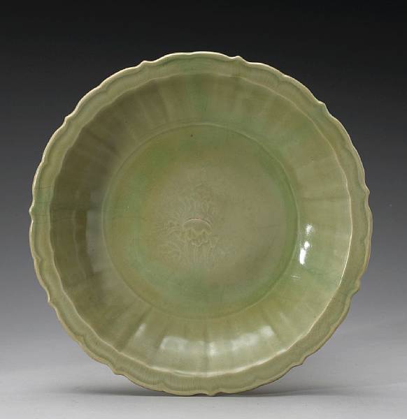 Appraisal: A Longquan celadon dish Ming Dynasty Thickly molded with a