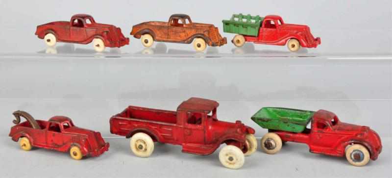 Appraisal: Lot of Cast Iron Vehicle Toys American Various small trucks