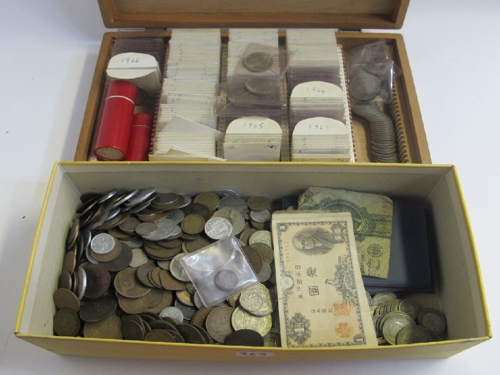 Appraisal: Lot comprising two boxes of assorted coins and banknotes