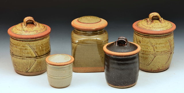 Appraisal: Richard BatterhamTwo jars and covers ash glaze and incised motifs